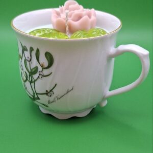Rose in cup
